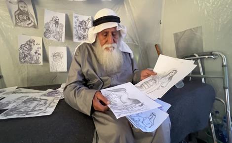 المسن زملط يوثق بريشته معاناة الحرب في غزة